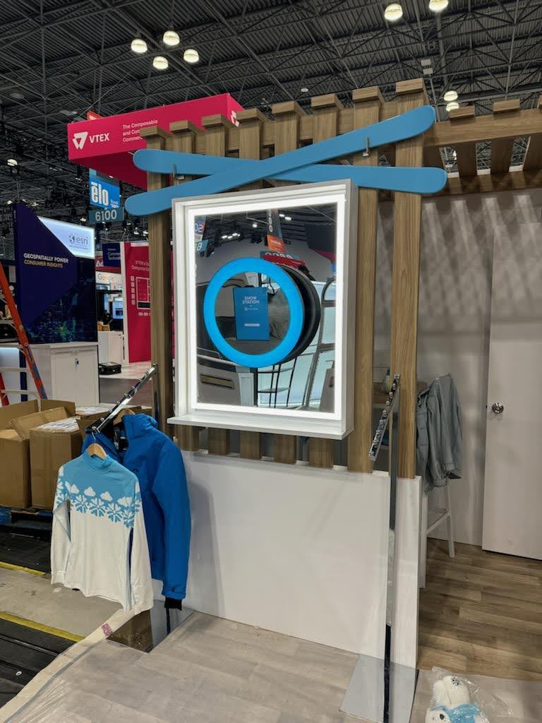 Wall-mounted photo booth at Snowflake trade show
